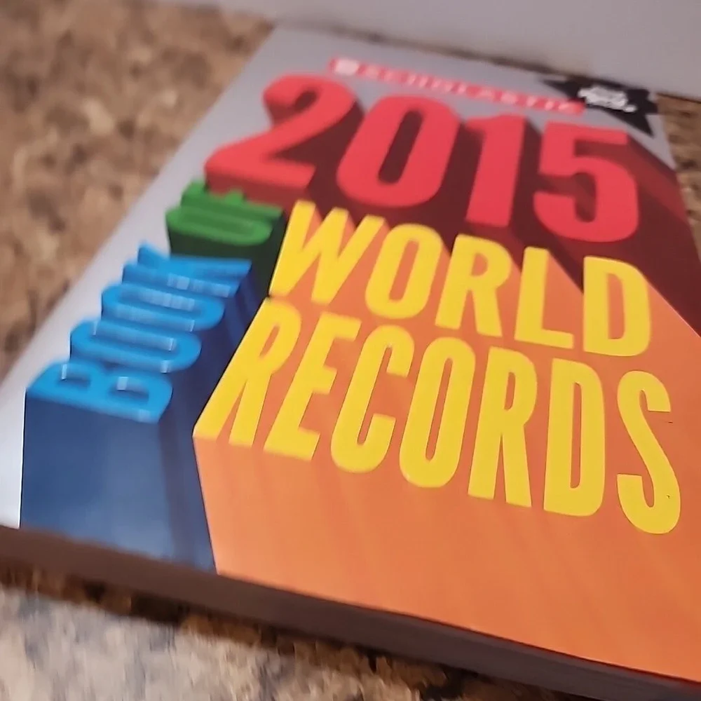 Scholastic 2015 Book of World Records by Jennifer Corr Morse Music Animals Movie